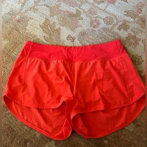 Red Lululemon Speed Up high-rise shorts